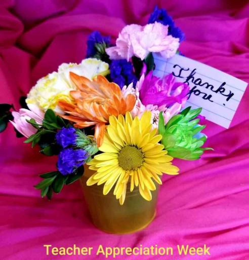 A teacher's "Thank You" bouquet on a bright pink background